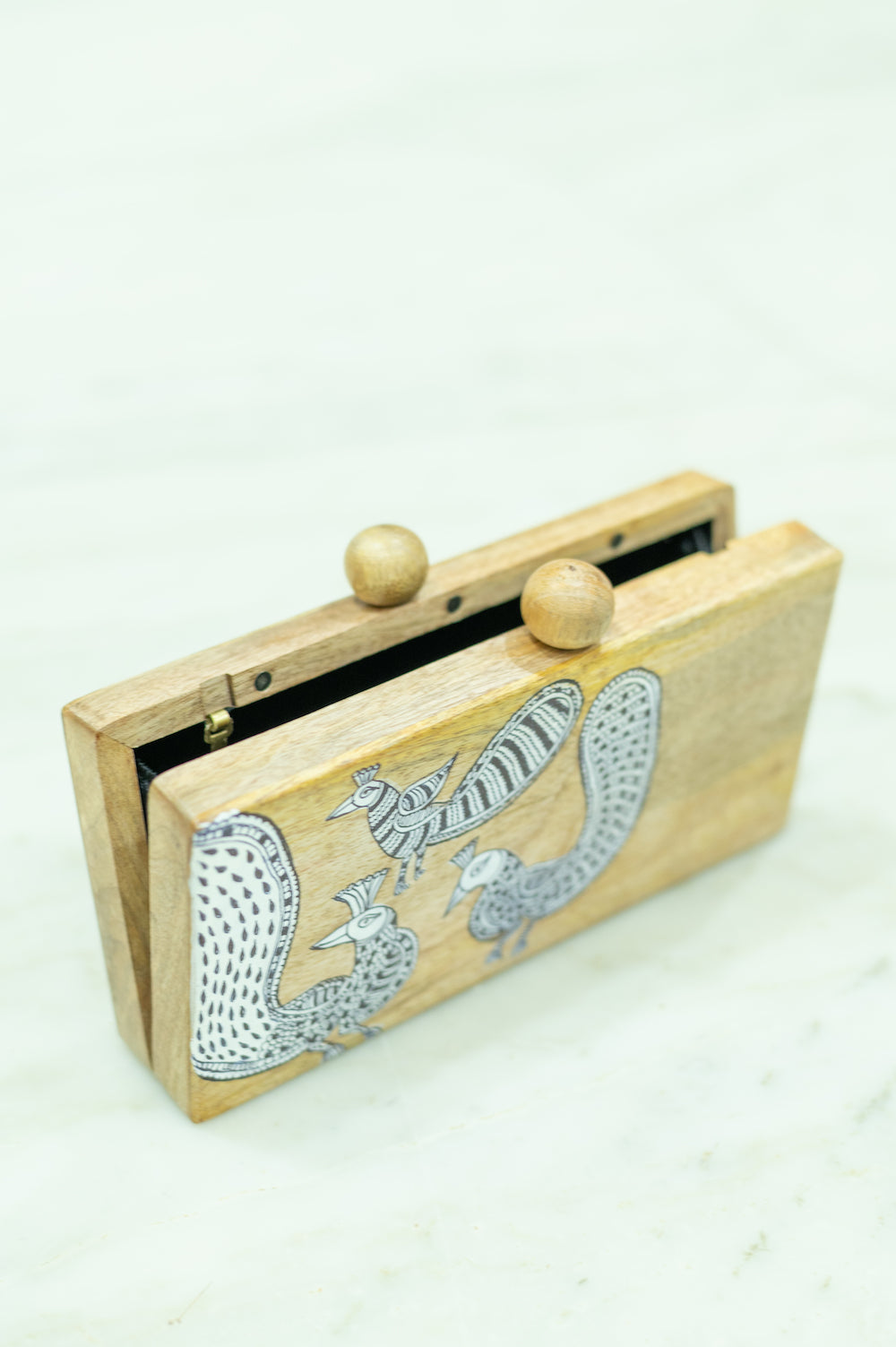 rectangular peacock clutch in wood with mata ni pachedi work